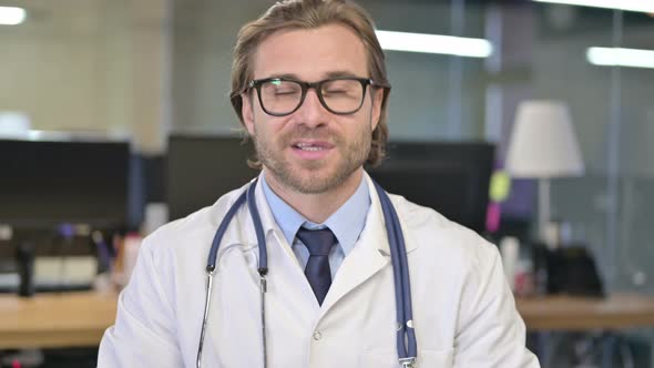 Portrait of Doctor Having Conversation, Video Chat