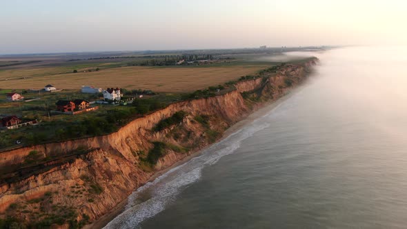 An early morning sunrise on the seashore line.