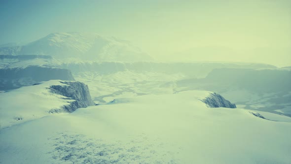 Winter Snow Covered Mountain Rock