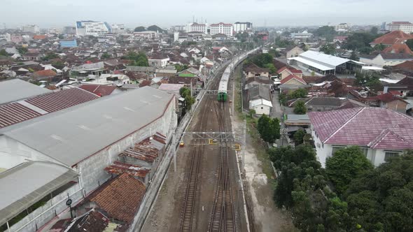 aerial view, The train that runs slowly begins to depart from Lempuyangan Yogyakarta station and sho