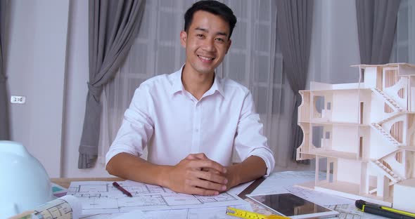 Young Architect Smiling And Looking At Camera