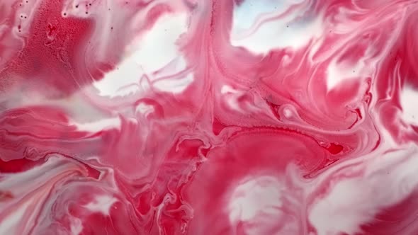 Red and White Abstract Pattern Oil Surface Splashing Chemical Reaction