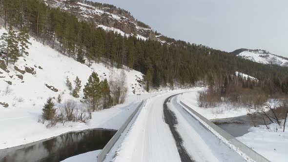 Winter Road With River