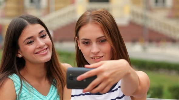 Smiling Girls Taking Selfie With Smartphone Camera