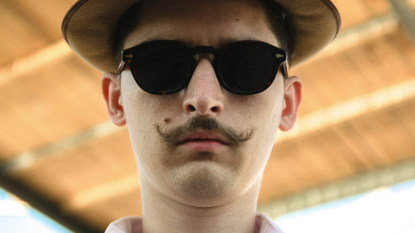 Gentleman In A Hat Sunglasses And A Mustaches