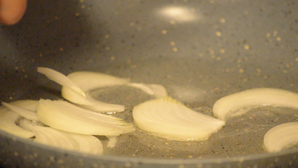 Onion On Hot Oil Pan