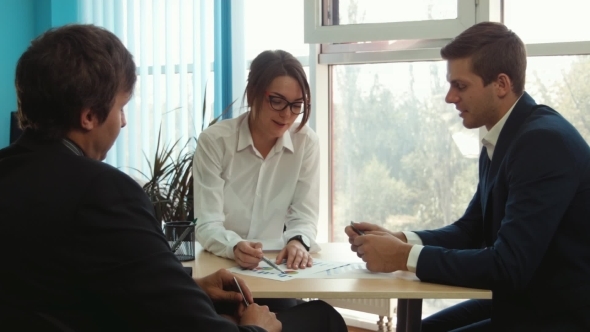 A Conversation Between Three Businessmen