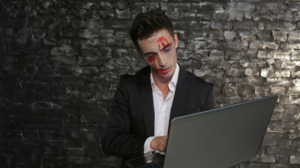Male Vampire Uses The Laptop