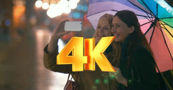 Female Friends Taking Selfie On Smartphone alt