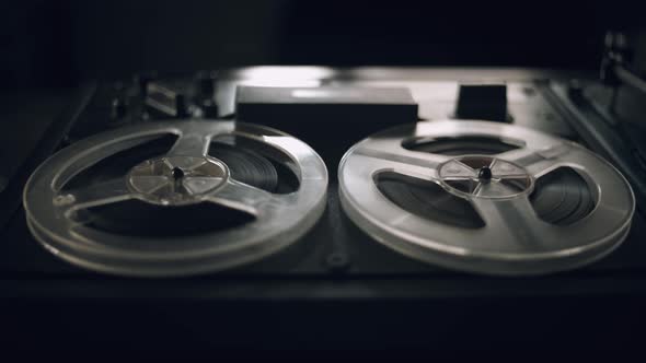 Vintage Tape Recorder Roller. Reel Film Tape Is Rotating at a Vintage Professional Player. Oldschool