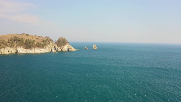 Kekura and Rocky Cape Telyakovsky Washed By the Sea of Japan on a Sunny Day