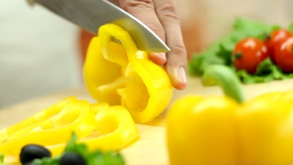 Cutting Yellow Bell Pepper