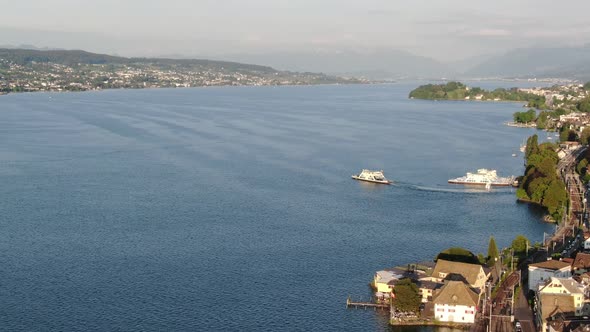 Aerial shot of a ferry on Zurichsee lake in Switzerland