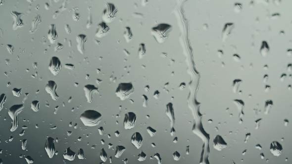 Rain Drops On A Glass alt
