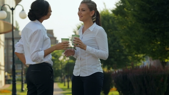 Two Girls Having Conversation During Coffee