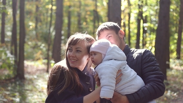 Family Walk In The Nature In Autumn