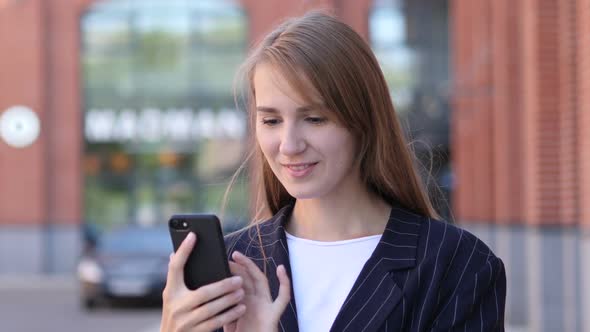 Portrait of Business Woman Busy Using Smartphone