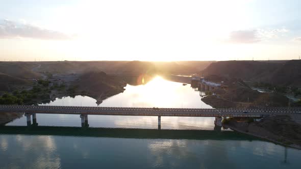 Sunset with a View of the Dam and Bridge