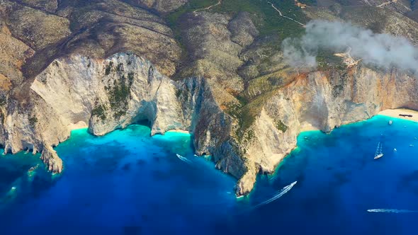 View of Navagio beach, Zakynthos Island, Greece. Aerial landscape. Azure sea water. Rocks and sea.