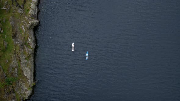 Drone Shot on Two People on SUP Board in Norway