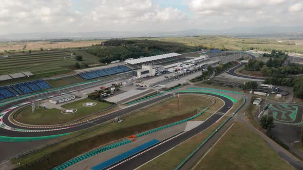 Aerial view of Hungaroring paddock during endurance competition, race track and final corners