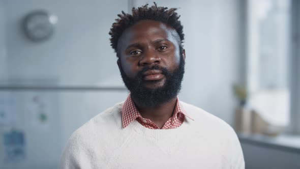 Bearded Black Man In Office Portrait