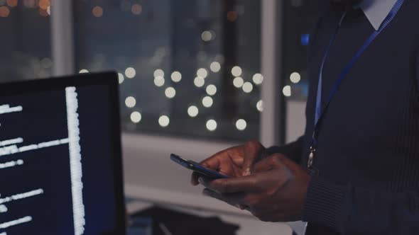 Man Texting on Smartphone