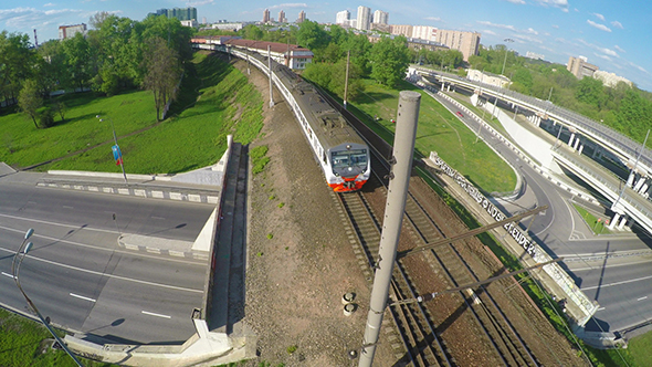 Fast Moving Train On The Bridge Near The Junction