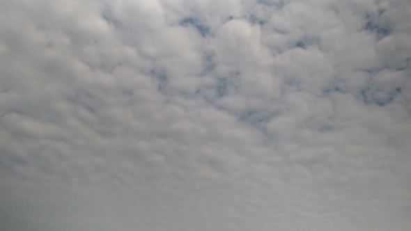 Clouds Moving In The Blue Sky