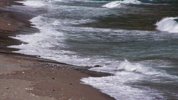 Yacht In The Bay And Sea Waves