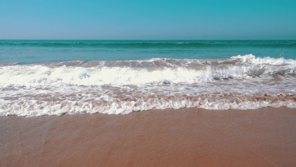 Ocean Waves With Sun Reflection