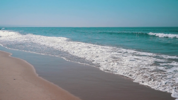 Ocean Waves With Sun Reflection