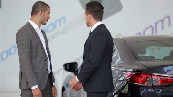 Shaking Hands While Purchase New Car