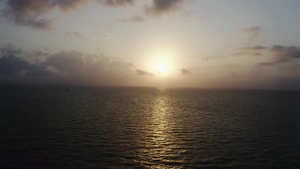 Aerial Drone View of Colorful Bright Clouds During Sunset Over the Sea or Ocean