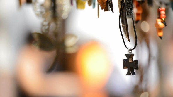 Wooden Cross in Leather Necklace Hanging. alt