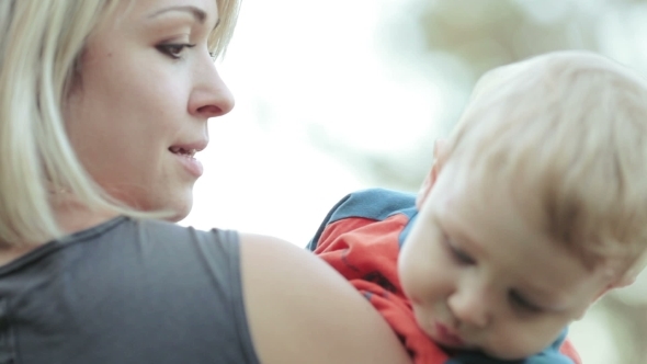 Child On Hand His Mother alt