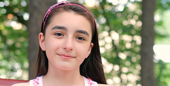 Child Girl Smiling at Camera