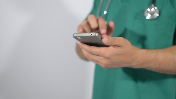 Doctor Using Smartphone alt
