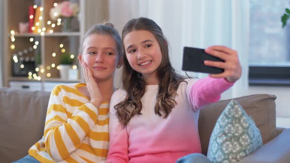 Happy Girls Taking Selfie with Smartphone at Home