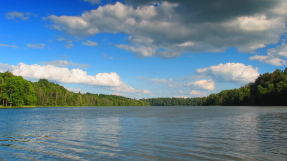 White Clouds Fly Over The Lake