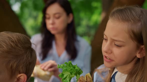 Relaxed Girl Eat Sandwich on Picnic Close Up