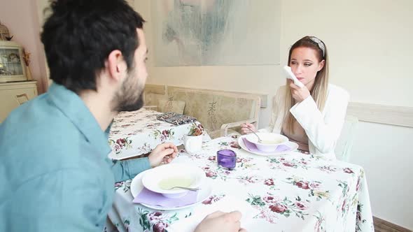 Young Couple Eating Soup In A Restaurant 2 alt
