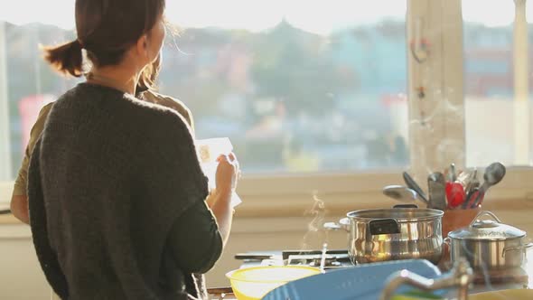 Young Couple Preparing Lunch In The Kitchen 10 alt