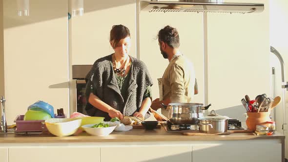 Young Couple Preparing Lunch In The Kitchen 13