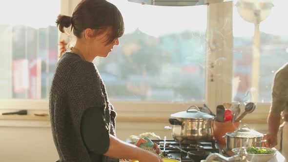 Young Couple Preparing Lunch In The Kitchen 14