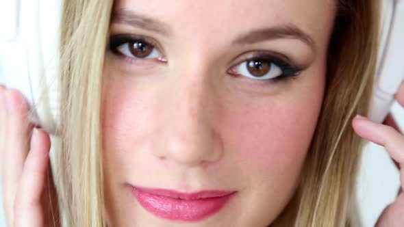 Close Up Of Beautiful Young Blond Woman Dancing With White Headphones 5 alt
