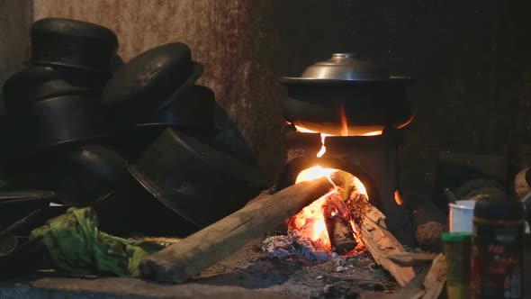 View Burning Fire Heating A Pot For Cooking In Local Kitchen In Sri Lanka 2