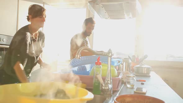Young Couple Preparing Lunch In The Kitchen 9