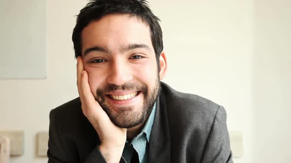 Handsome Young Man Smiling Into The Camera 1 alt