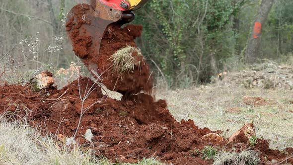 Heavy Machinery Digger Excavating Earth For Construction